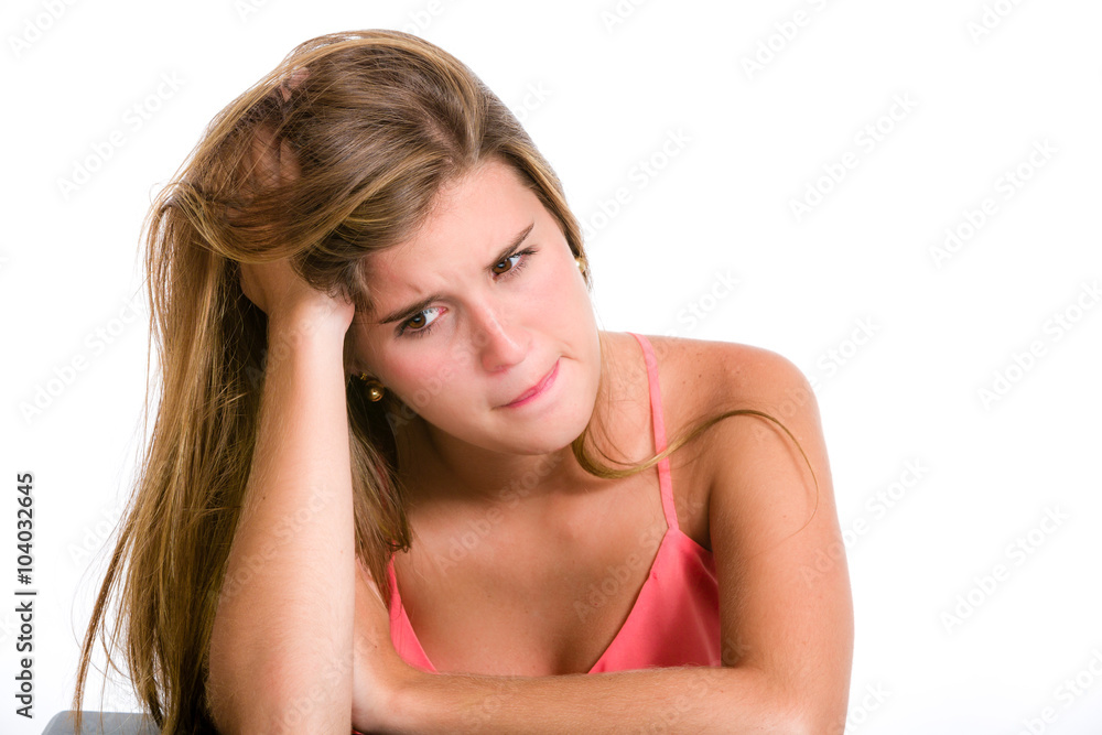 Sadness, sorrow, worries in a Hispanic young woman about to cry Sadness, sorrow, worries in a Hispanic young woman about to cry