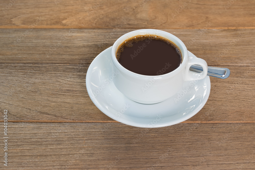 Cup of coffee on wooden table Cup of coffee on wooden table