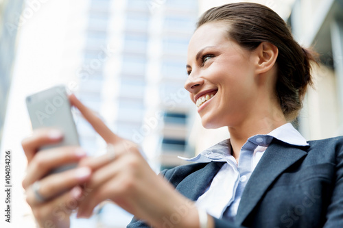 Portrait of business woman smiling outdoor Free Download Portrait of business woman smiling outdoor - GFXLoad