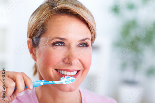 Beautiful senior woman with a toothbrush.