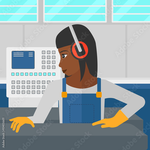 Woman working on steel-rolling mill.