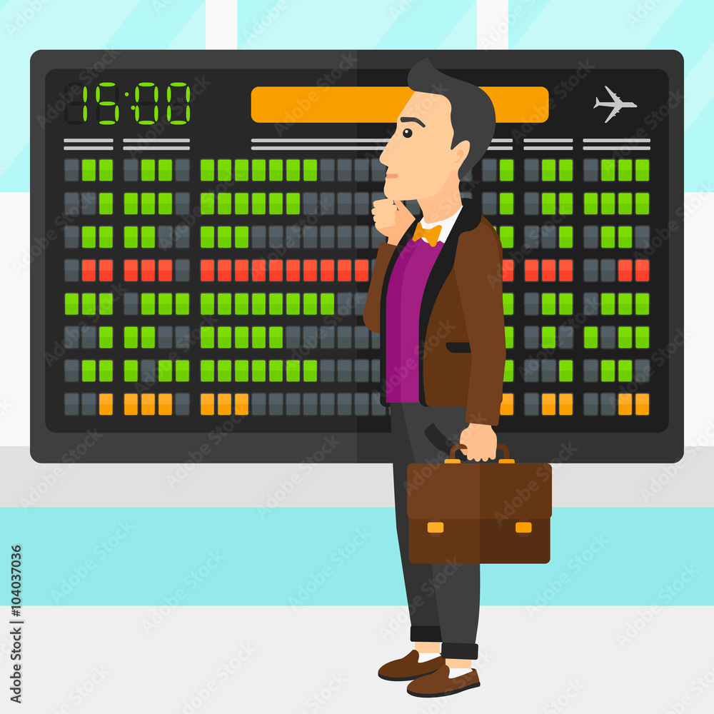 Man looking at schedule board. Man looking at schedule board.