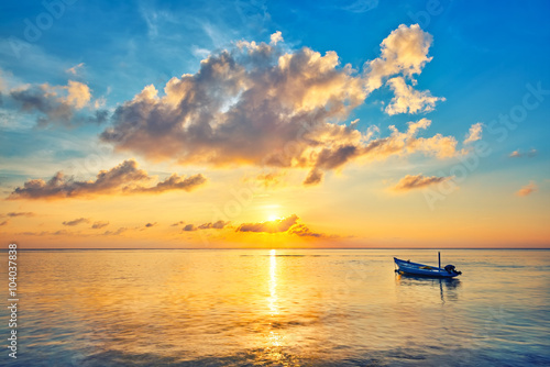 Colorful sunrise over ocean on Maldives