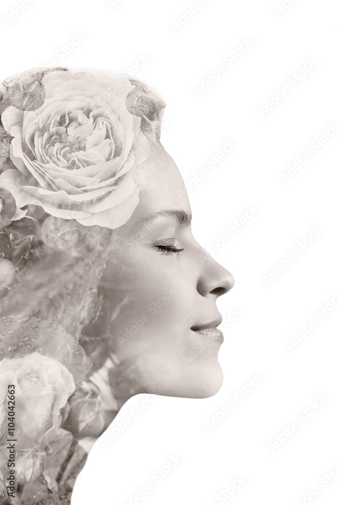 creative portrait of beautiful young woman made from double exposure effect using photo of roses flowers, isolated on white background, toned