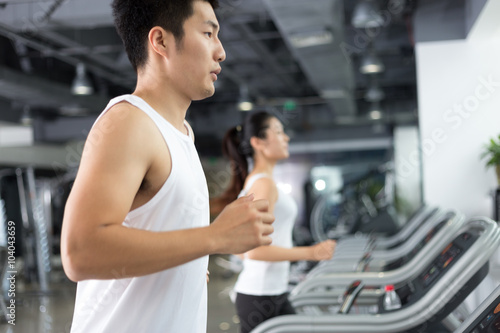 young people working out in modern gym