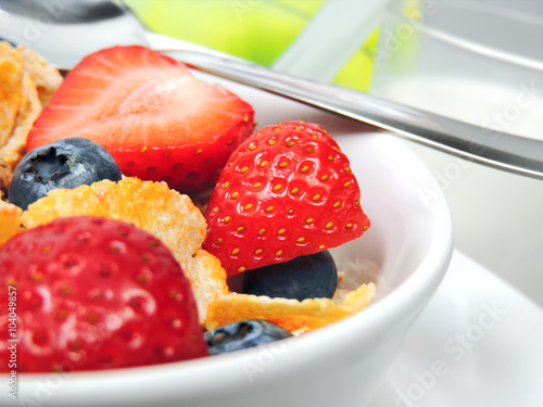 Breakfast bowl with cereals and fresh fruits. photo