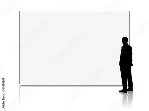 man in front of a big white screen © magann