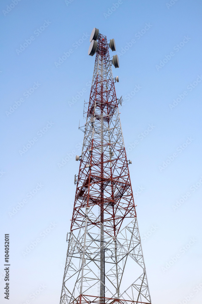 Telecommunications tower with clear blue sky. Telecommunications tower with clear blue sky.