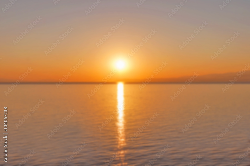 Sunset on the sea with burrning sun