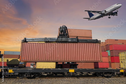 Wallpaper Mural forklift handling and train and air plan with container in shipyard for Logistic Import Export background at sunset Torontodigital.ca