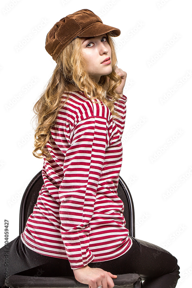 Beautiful girl with long hair in a brown cap Beautiful girl with long hair in a brown cap