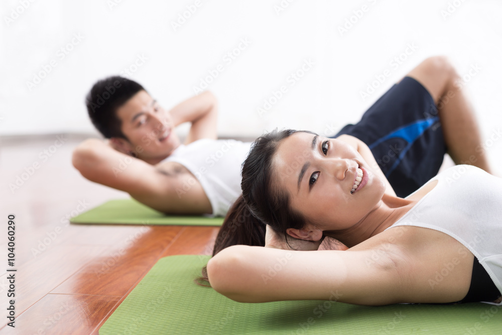 people working out in modern gym people working out in modern gym