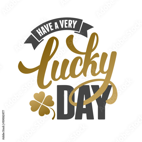 Calligraphic Inscription with Wishes a Very Lucky Day for Saint Patricks Day. Shamrock - Talisman for Success, Wealth. Hand Drawn Lettering. Vector Illustration. Isolated on White Background. photo