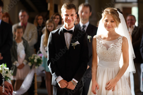 classic wedding ceremony of stylish young luxury bride and groom