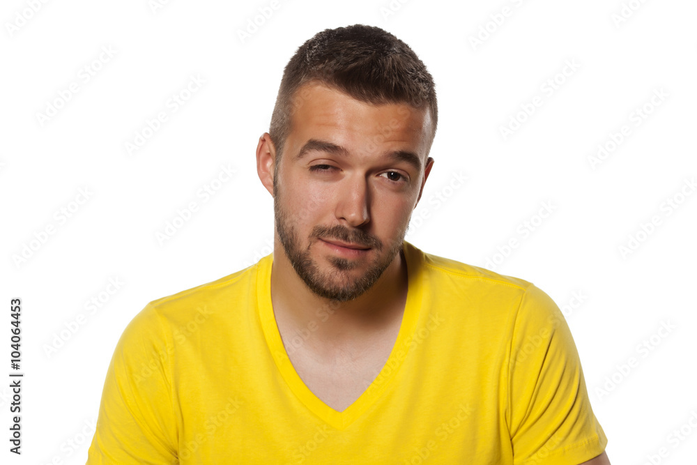 thoughtful and skeptical young handsome man thoughtful and skeptical young handsome man