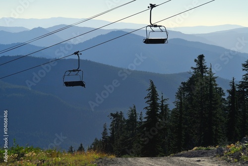 Chairlift on Mount Hood with mountains in the background. Oregon, US Pacific Northwest.