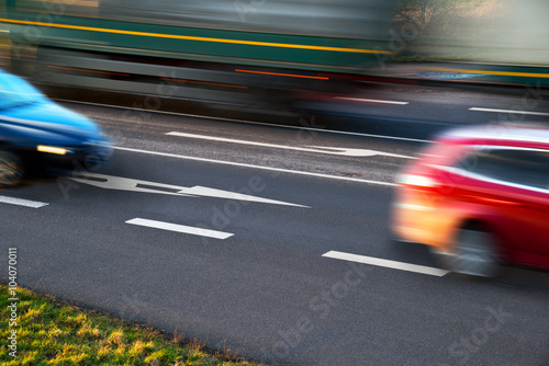 Speeding cars at a crossroad