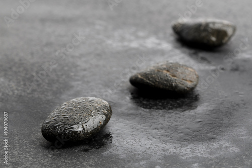 Dark and wet stones for background