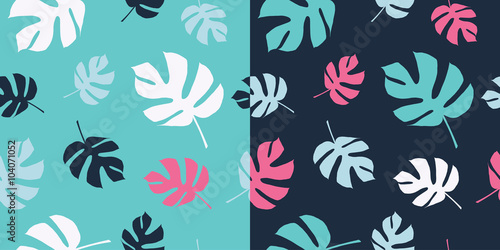 Set of two seamless backgrounds with decorative palm leaves. Print. Cloth design  wallpaper.