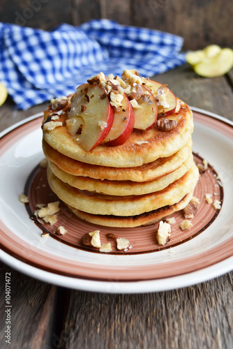 Pancake with apples and nuts, rustic style