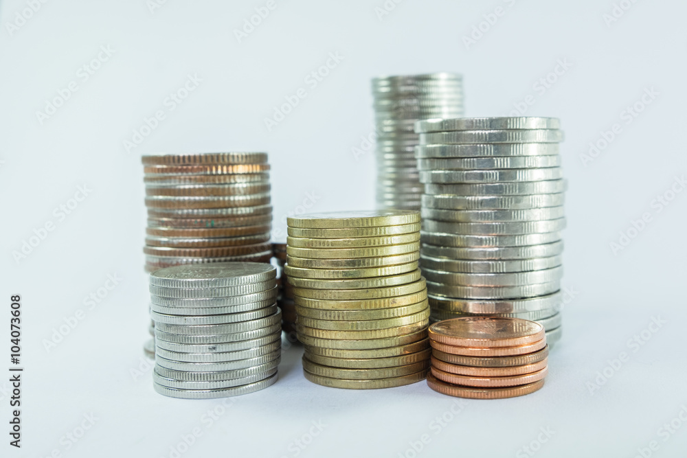 Stack of Coins isolated on white background - business finance concept Stack of Coins isolated on white background - business finance concept