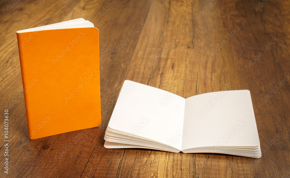 Blank catalog, magazines,book mock up on wood background Blank catalog, magazines,book mock up on wood background