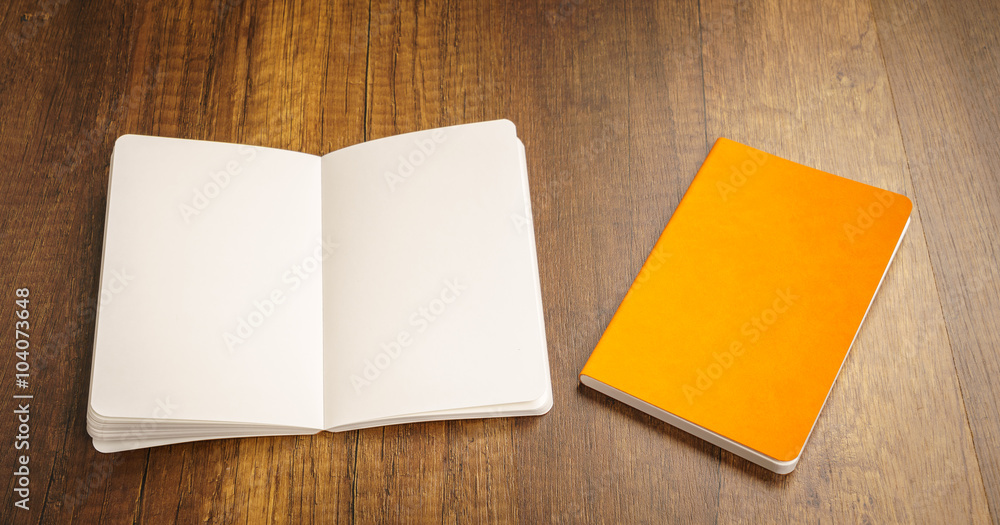 Blank catalog, magazines,book mock up on wood background Blank catalog, magazines,book mock up on wood background