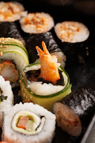 Shrimp sushi roll with rice and cucumber
