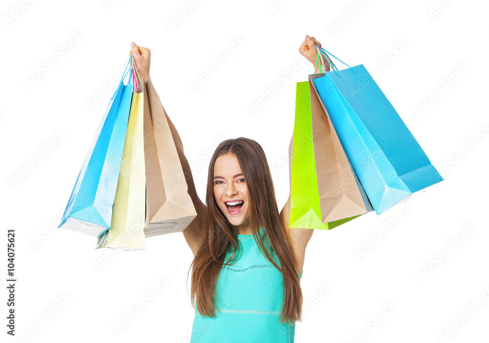 Happy beautiful woman with shopping bags isolated on white. Happy beautiful woman with shopping bags isolated on white.