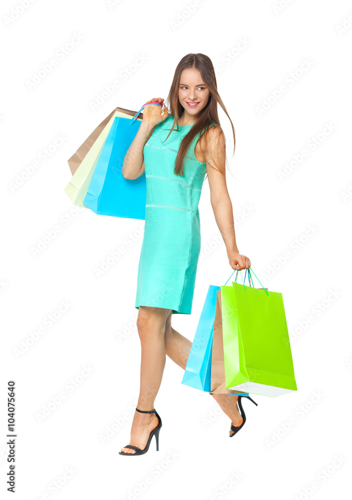 Fullbody portrait of beautiful woman with bags isolated on white Fullbody portrait of beautiful woman with bags isolated on white