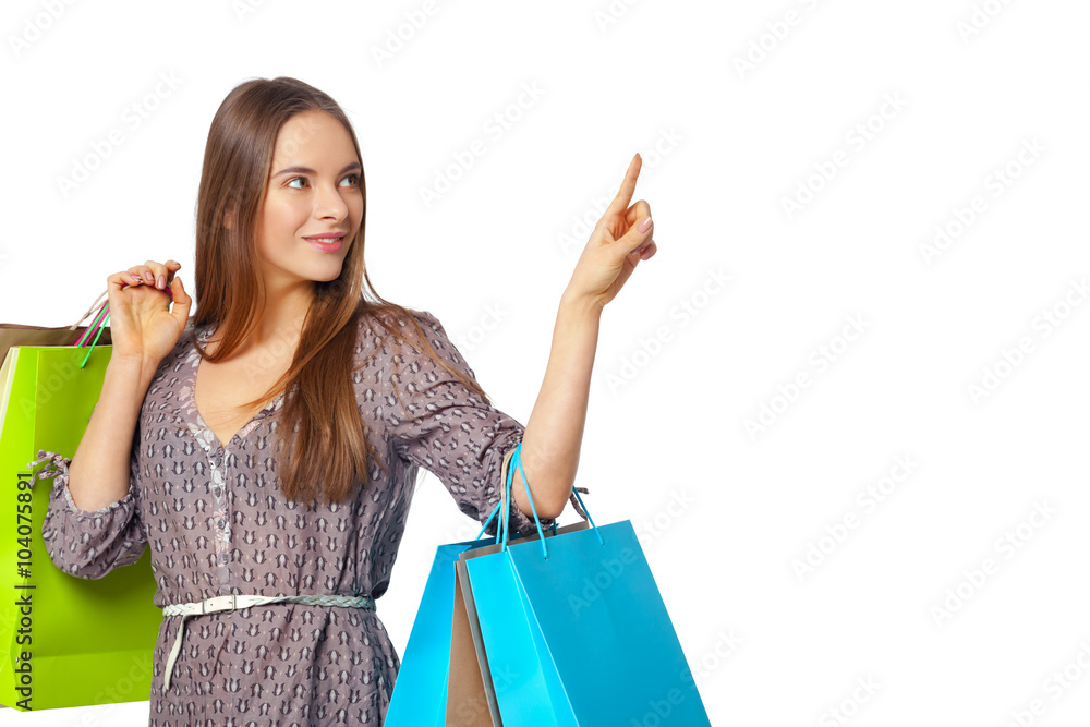 Happy beautiful woman with shopping bags isolated on white. Happy beautiful woman with shopping bags isolated on white.