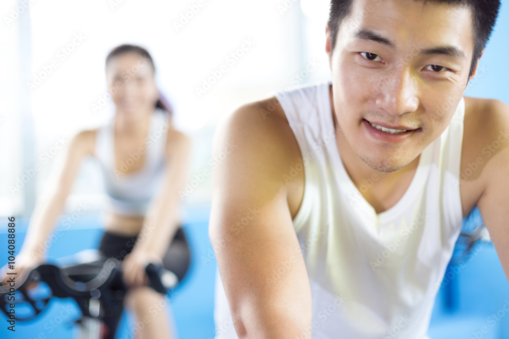 people working out in modern gym people working out in modern gym