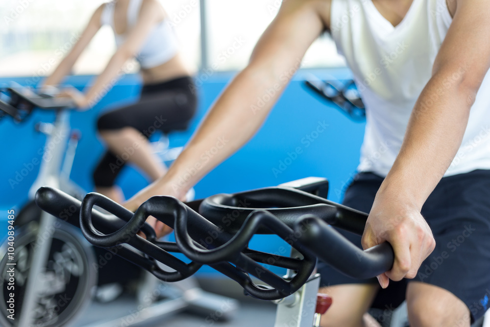 people working out in modern gym people working out in modern gym
