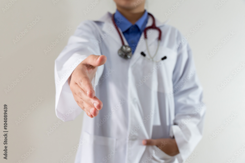 Female doctor giving hand for handshake Female doctor giving hand for handshake