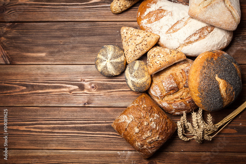Bread assortment on wooden surface