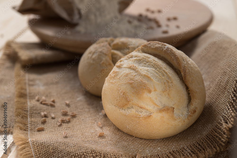 white bread and flour on the table white bread and flour on the table