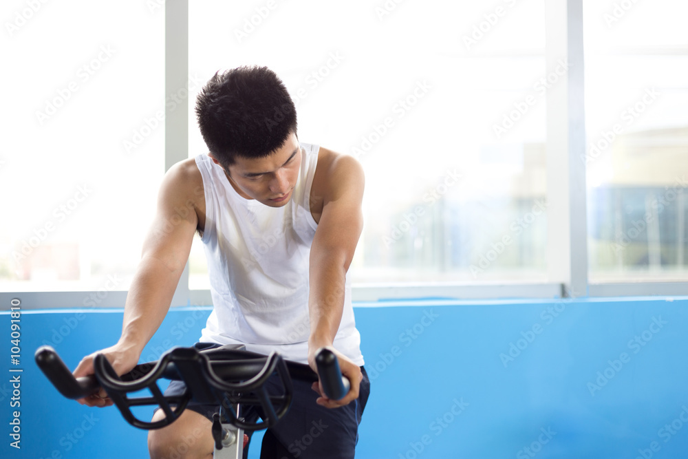 people working out in modern gym people working out in modern gym