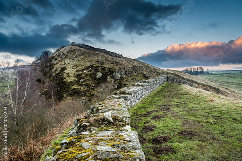 Tela Hadrian's Wall above Cawfield Crags on the Pennine Way walking trail