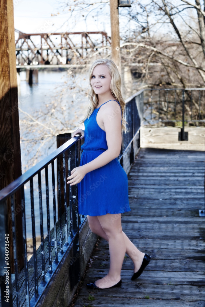 Blond Caucasian Woman Outdoor In Blue Dress