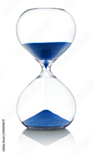 Hourglass with running blue sand over white