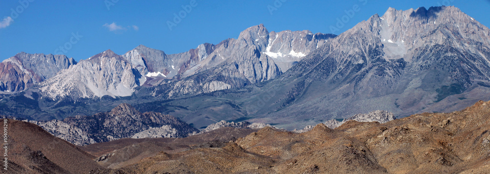 The granite Sierra Nevada Mountains provide a stark barrier between the deserts of Nevada and California’s Yosemite National Park.