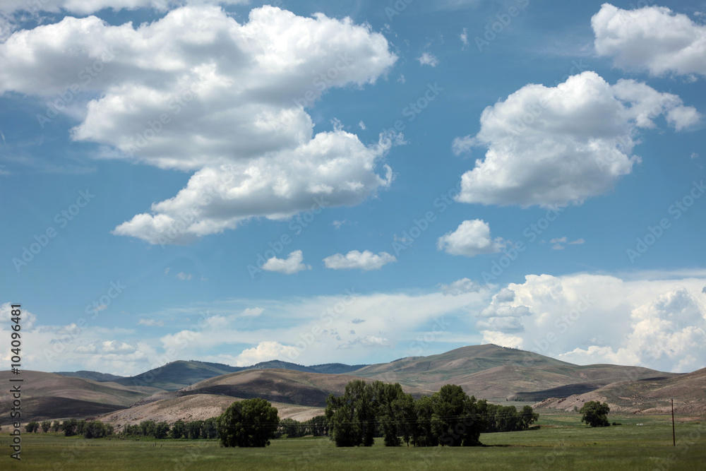The Rocky Mountains of southwestern Colorado are set against imposing skies.