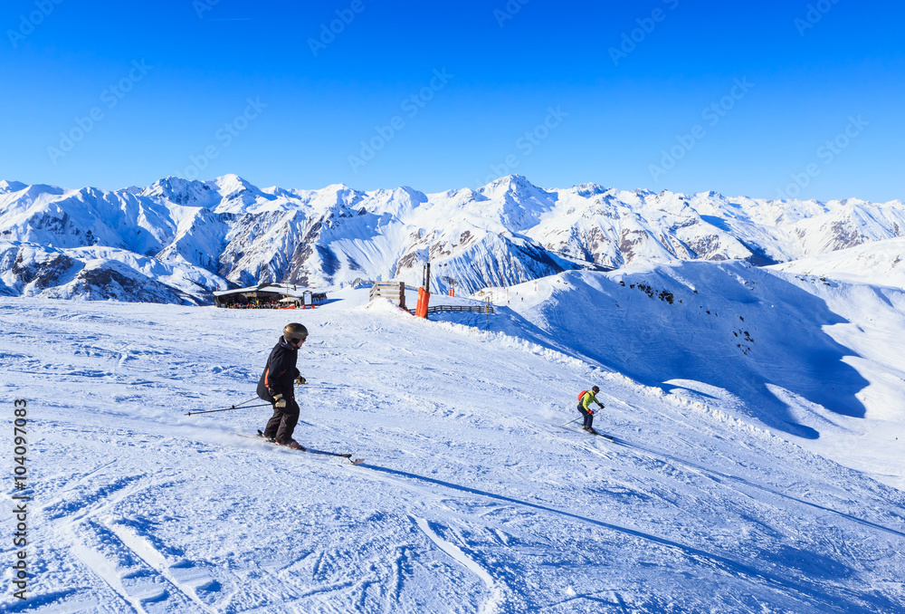 Skiers on the slopes of the ski resort of Meribel, France