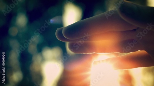 Sun Dust - High speed POV shot of waving fingers through sun rays and dust.