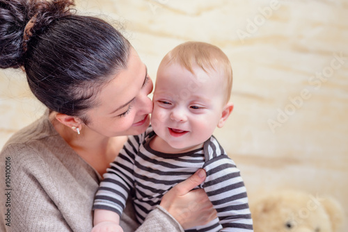 Loving portrait of a young mother with her baby
