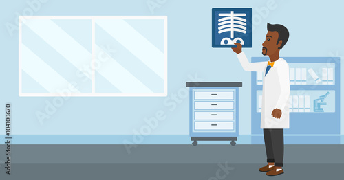 Doctor examining radiograph.
