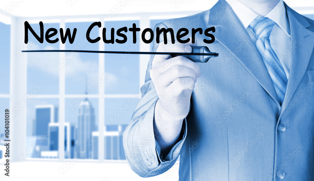 businessman writing new customers businessman writing new customers