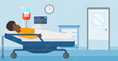 Patient lying in hospital bed.