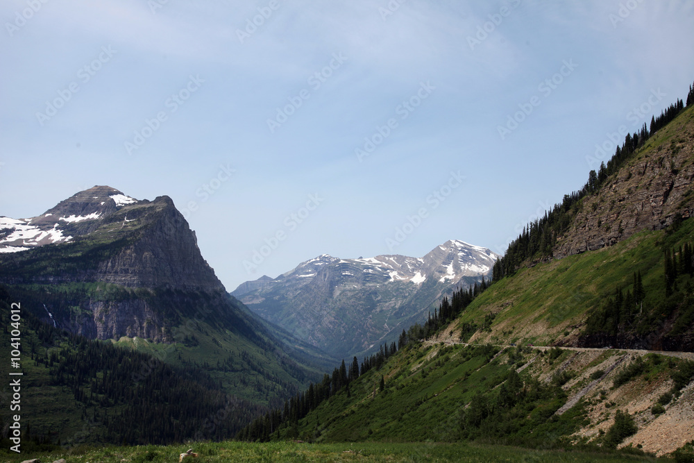 The imposing rocky glacial peaks of Glacier National Park in northwest Montana straddle the U.S.-Canadian border, with the Canadian side of the park called Waterton Lakes National Park in Alberta.