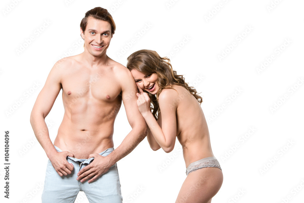 Cheerful naked couple isolated. Two lovers.
